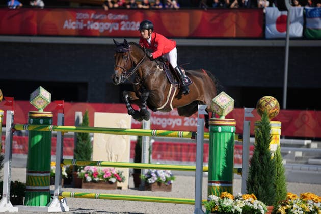 (261001) -- TOKYO, Oct. 1, 2026 -- Sato Eiken of team Japan competes during the jumping team final of equestrian at the 20th Asian Games Aichi-Nagoya 2026 in Tokyo, Japan, Oct. 1, 2026. (Photo by Xinhua) (SP)JAPAN-TOKYO-ASIAN GAMES-EQUESTRIAN-JUMPING TEAM-FINAL WangxShen