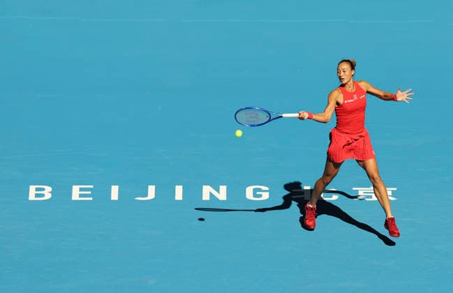 (261001) -- BEIJING, Oct. 1, 2026 -- Zheng Qinwen competes during the women s singles first round match between Zheng Qinwen of China and Shi Han of China at 2026 China Open tennis tournament in Beijing, China, Oct. 1, 2026. ) (SP)CHINA-BEIJING-TENNIS-CHINA OPEN-WOMEN S SINGLES(CN) BaixXuefei 