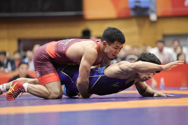 (261001) -- NAGOYA, Oct. 1, 2026 -- Kyrgyzstan s Zholoman Sharshenbekov (L) competes against Uzbekistan s Alisher Ganiev during their Men s Greco-Roman 60kg Final Bout of Wrestling at the 20th Asian Games Aichi-Nagoya 2026 in Nagoya, Japan, Oct. 1, 2026. ) (SP)JAPAN-NAGOYA-ASIAN GAMES-WRESTLING-MEN S GRECO-ROMAN 60KG LongxLei