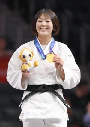 Aichi-Nagoya Asian Games: Judo Japan s Narumi Tanioka poses after winning the Aichi-Nagoya Asian Games women s judo 63-kilogram gold at Aichi International Arena in Nagoya, central Japan, on Oct. 1, 2026. A14AA0005629653P