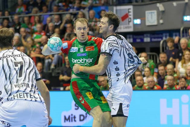 September 30, 2026, xgox, Handball Opel HBL SC Magdeburg vs. THW Kiel emspor, from left: Felix Claar (Magdeburg), 7, Veron Nacinovic (Kiel), 93; duel, battle, tackle (Magdeburg)