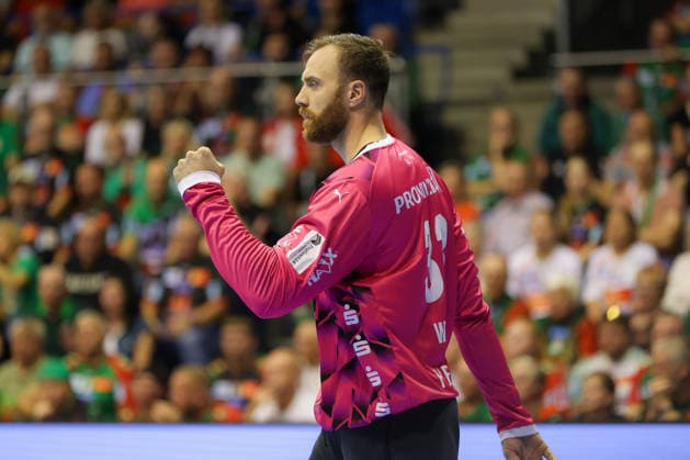 September 30, 2026, xgox, Handball Opel HBL SC Magdeburg vs. THW Kiel emspor, from left: Andreas Wolff (Kiel), 33, celebrating a save; blocked, saved; Magdeburg goalkeeper