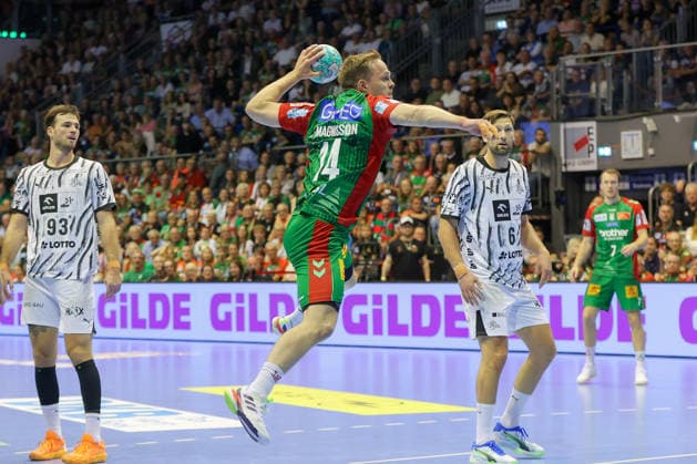 September 30, 2026, xgox, Handball Opel HBL SC Magdeburg vs. THW Kiel emspor, from left: Omar Ingi Magnusson (Magdeburg), 14 shots on goal, goal scorers, scores a goal, Magdeburg