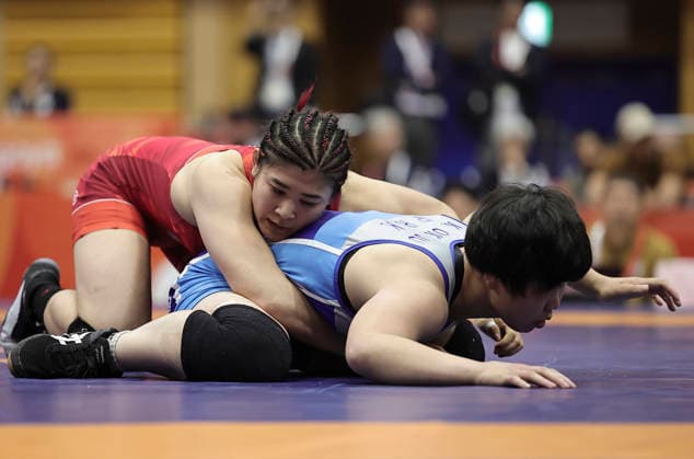 (261001) -- NAGOYA, Oct. 1, 2026 -- Ozaki Nonoka (L) of Japan competes with Kim Ok Ju of the Democratic People s Republic of Korea (DPRK) during the women s 62kg final match of Wrestling at the 20th Asian Games Aichi-Nagoya 2026 in Nagoya, Japan, Oct. 1, 2026. ) (SP)JAPAN-NAGOYA-ASIAN GAMES-WRESTLING-WOMEN S 62KG LongxLei