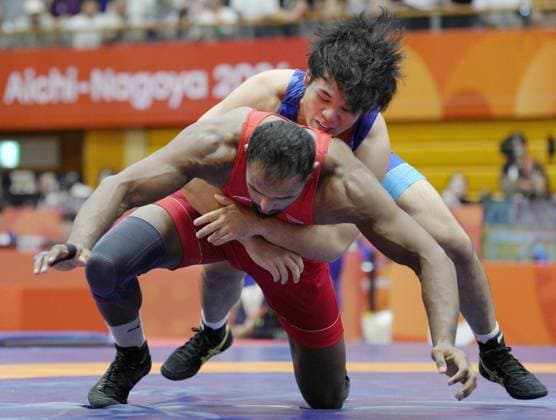 Aichi-Nagoya Asian Games: Wrestling Japan s Yuri Nakazato (blue) competes en route to beating Nitesh of India in the Aichi-Nagoya Asian Games men s wrestling Greco-Roman 97-kilogram final at Nagoya City Inae Sports Center in Nagoya, central Japan, on Oct. 1, 2026. A14AA0005629656P