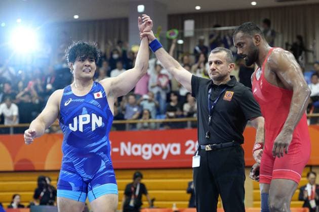 Aichi-Nagoya Asian Games: Wrestling Japan s Yuri Nakazato (blue) beats Nitesh of India in the Aichi-Nagoya Asian Games men s wrestling Greco-Roman 97-kilogram final at Nagoya City Inae Sports Center in Nagoya, central Japan, on Oct. 1, 2026. A14AA0005629658P