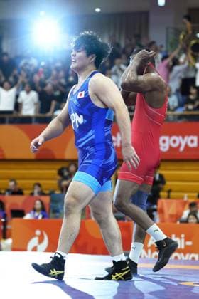 Aichi-Nagoya Asian Games: Wrestling Japan s Yuri Nakazato (blue) reacts after beating Nitesh of India in the Aichi-Nagoya Asian Games men s wrestling Greco-Roman 97-kilogram final at Nagoya City Inae Sports Center in Nagoya, central Japan, on Oct. 1, 2026. A14AA0005629659P