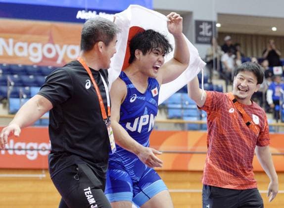 Aichi-Nagoya Asian Games: Wrestling Japan s Yuri Nakazato celebrates after beating Nitesh of India in the Aichi-Nagoya Asian Games men s wrestling Greco-Roman 97-kilogram final at Nagoya City Inae Sports Center in Nagoya, central Japan, on Oct. 1, 2026. A14AA0005629661P