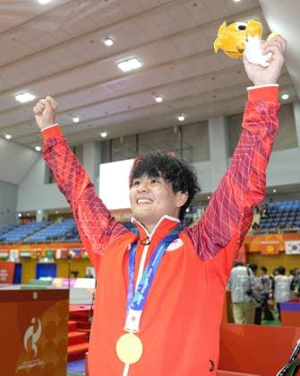 Aichi-Nagoya Asian Games: Wrestling Japan s Yuri Nakazato celebrates after winning the Aichi-Nagoya Asian Games men s wrestling Greco-Roman 97-kilogram gold at Nagoya City Inae Sports Center in Nagoya, central Japan, on Oct. 1, 2026. A14AA0005629664P