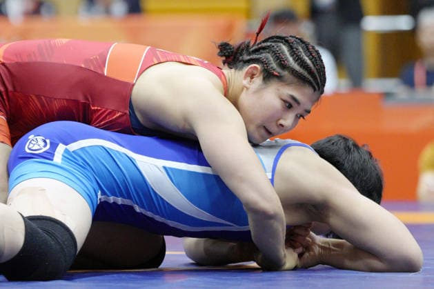 Aichi-Nagoya Asian Games: Wrestling Japan s Nonoka Ozaki (red) competes en route to beating Kim Ok Ju of North Korea in the Aichi-Nagoya Asian Games women s wrestling 62-kilogram final at Nagoya City Inae Sports Center in Nagoya, central Japan, on Oct. 1, 2026. A14AA0005629666P