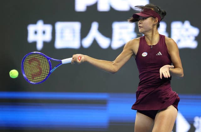 (261001) -- BEIJING, Oct. 1, 2026 -- Sun Xinran of China hits a return during the women s singles first round match against Eva Lys of Germany at 2026 China Open tennis tournament in Beijing, China, Oct. 1, 2026. ) (SP)CHINA-BEIJING-TENNIS-CHINA OPEN-WOMEN S SINGLES(CN) MaxZihan