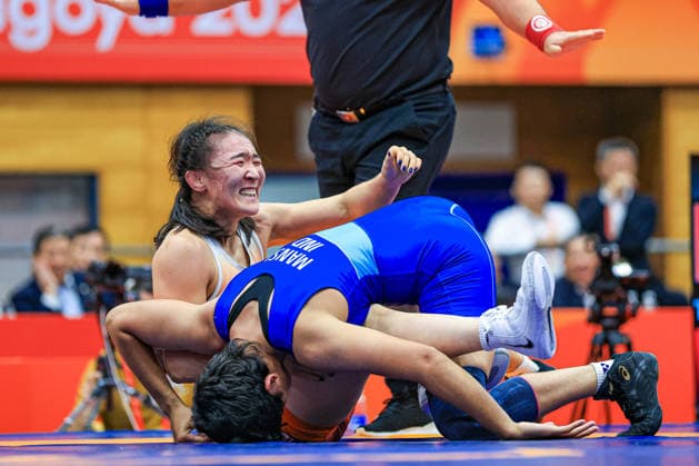 Asian Games, 62 kg Open Weight: Altjin Togtokh (MGL) def. Mansi Mansi (IND) Copyright: xAmirrezaxAliasgarix