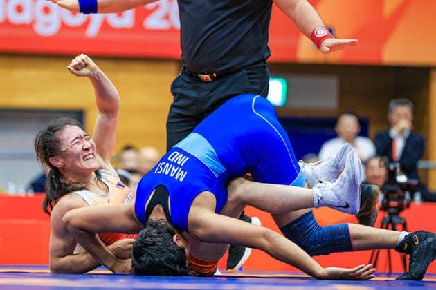 Asian Games, 62 kg Open Weight: Altjin Togtokh (MGL) def. Mansi Mansi (IND) Copyright: xAmirrezaxAliasgarix