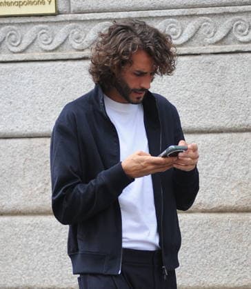 RECORD DATE NOT STATED IPA89184282 - Milan—photo by Mimmo Carriero—Olympic champion Gianmarco Tamberi arrives in the city center and enters the prestigious Omega boutique to buy an extremely expensive watch  Copyright: xx xx 0868338368st