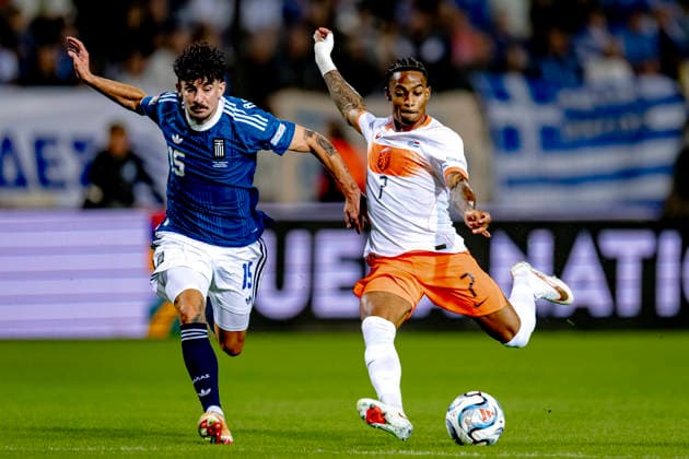 THESSALONIKI: Greece midfielder Thanasis Androutsos and Netherlands forward Crysencio Summerville during the UEFA Nations League match between Greece and the Netherlands at Toumba Stadium on October 1, 2026, in Thessaloniki, Greece. Photo by DeFodi Images