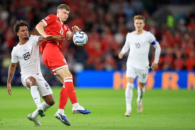 Wales v Denmark UEFA Nations League Joredan James of Wales battles for the ball with Oscar Bobb Of Norway during the UEFA Nations League Group D match at the Cardiff City Stadium, Cardiff 01 10 2026 UK Newspapers OUT Copyright: xGeraintxNicholasx FIL-24019-0029