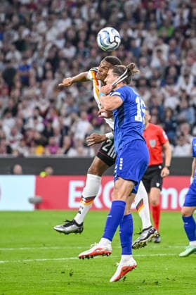 Malick Thiaw of Germany and Srdan Babic of Serbia battle for the ball during the UEFA Nations League 2026-27 group stage match between Germany and Serbia at Allianz Arena on October 1, 2026, in Munich, Germany. Photo by Harry Langer, DeFodi Images