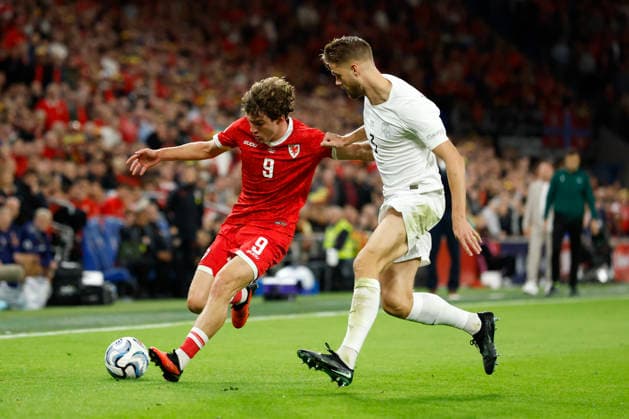 Cardiff, Wales, 1st October 2026. Lewis Koumas of Wales and Kristoffer Ajer of Norway during the Wales vs Norway UEFA Nations League match at the Cardiff City Stadium, Cardiff. Picture credit should read: Cody Froggatt Sportimage EDITORIAL USE ONLY. No use with unauthorised audio, video, data, fixture lists, club league logos or live services. Online in-match use limited to 120 images, no video emulation. No use in betting, games or single club league player publications. SPI_045_CF_WALES_NORWAY SPI-5050-0045