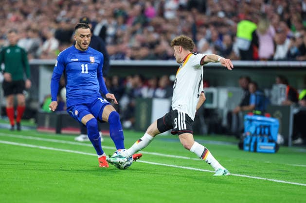 October 1, 2026, GER, Soccer, Men s, UEFA Nations League International Match, League A, Matchday 3, Germany vs. Serbia Filip Kostic Serbia 11, left Philipp Treu Germany 13, right DFB DFL regulations prohibit any use of photographs as image sequences and or quasi-video Munich Allianz Arena Bayern Germany Copyright: xNordphoto Schneiderx