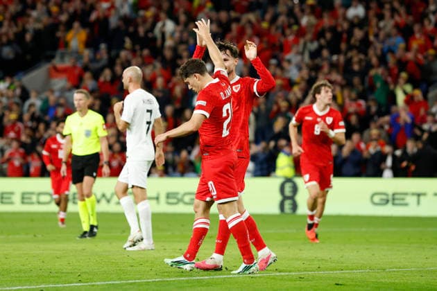 Cardiff, Wales, 1st October 2026. Daniel James of Wales celebrates with his team mates after scoring a goal to make it 1-1 during the Wales vs Norway UEFA Nations League match at the Cardiff City Stadium, Cardiff. Picture credit should read: Cody Froggatt Sportimage EDITORIAL USE ONLY. No use with unauthorised audio, video, data, fixture lists, club league logos or live services. Online in-match use limited to 120 images, no video emulation. No use in betting, games or single club league player publications. SPI_055_CF_WALES_NORWAY SPI-5050-0055
