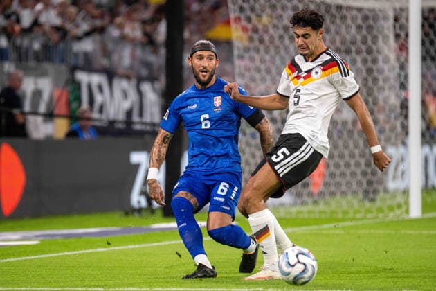 Nemanja Gudelj (SRB) and Aleksandar Pavlovic (GER) xettx, Germany, Munich, October 1, 2026, Soccer, National Team, Nations League: Germany vs. Serbia, 2026–2027 Season, Matchday 3, Allianz Arena