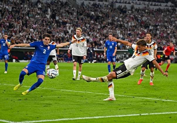 October 1, 2026, Soccer: 2026–2027 UEFA Nations League, Matchday 3, Germany vs. Serbia, at the Allianz Arena in Munich; Tom Bischof scores for Germany, beating Kosta Ndeljkovic of Serbia, 1–0