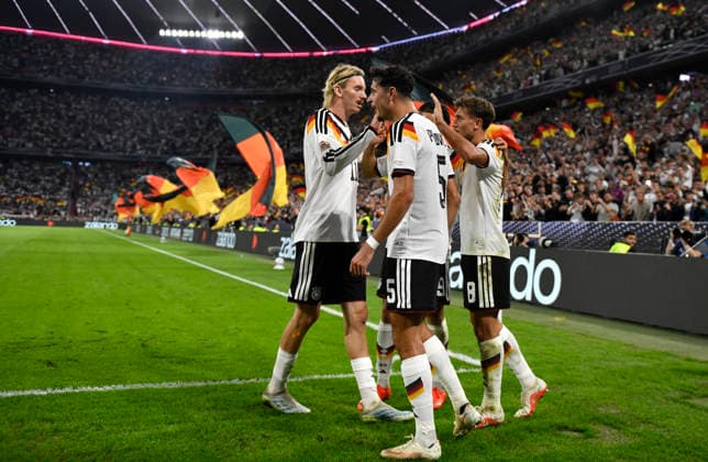 GOAL: 1–0 Tom Bischof GER 08 Goal celebration: Nick Woltemade GER 11 Alexander Pavlovic GER 05 DFB International Match: Germany GER vs. Serbia SER UEFA Nations League on October 1, 2026 DFL REGULATIONS PROHIBIT ANY USE OF PHOTOGRAPHS AS IMAGE SEQUENCES AND OR QUASI-VIDEO DFB International Match: Germany (GER) vs. Serbia (SER) – UEFA Nations League