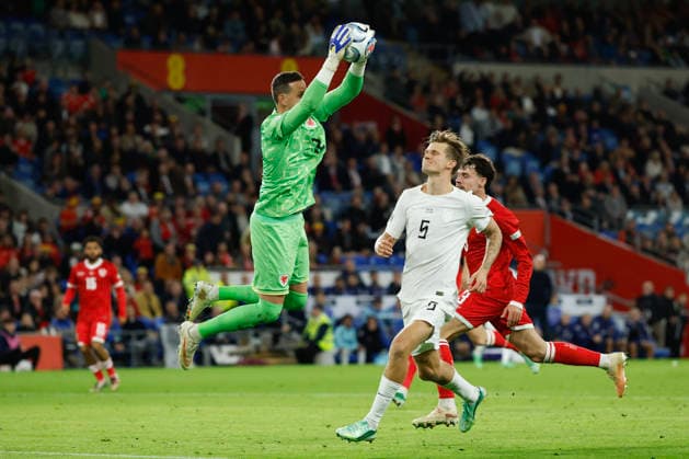 Cardiff, Wales, 1st October 2026. Danny Ward of Wales collects the ball ahead of David Moller Wolfe of Norway during the Wales vs Norway UEFA Nations League match at the Cardiff City Stadium, Cardiff. Picture credit should read: Cody Froggatt Sportimage EDITORIAL USE ONLY. No use with unauthorised audio, video, data, fixture lists, club league logos or live services. Online in-match use limited to 120 images, no video emulation. No use in betting, games or single club league player publications. SPI_086_CF_WALES_NORWAY SPI-5050-0086