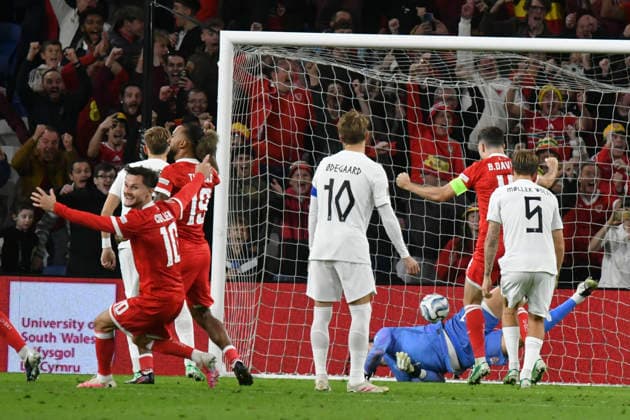 Football - 2026 2027 UEFA Nations League - League A, Group Four: Wales vs. Norway - Cardiff City Stadium - Thursday 1st October 2026 orjan Nyland NORWAY is beaten by a free kick from Neco Williams WALES from colorsport winston bynorth