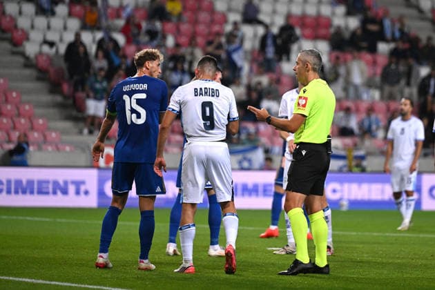 SOCCER - UEFA Nations League - Israel vs. Kosovo Photo by IPA ABACAPRESS.COM89190107 - Mergim Vojvoda (Kosovo) and Tai Baribo (Israel) with the referee during the Nations League phase, Matchday 3, League B Group B3, between Israel and Kosovo on October 1, 2026, at Nagyerdei Stadium in Debrecen, Hungary Haifa Israel  Copyright: xIPAxSport ABACAx