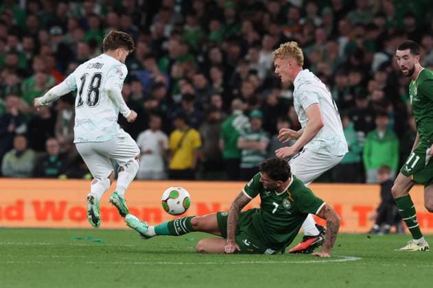 Ireland s Troy Parrott tackled by Romano Schmid and Nicolas Seiwald of Austria Republic of Ireland v Austria, UEFA Nations League, League B - Group 3, International Football, Aviva Stadium, Dublin, Ireland - 01 Oct 2026Dublin Aviva Stadium Ireland  Copyright: xLorrainexO Sullivan Shutterstockx 17178960au