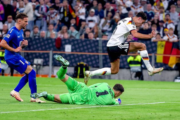 October 1, 2026, Soccer, International Match, Germany vs. Serbia, UEFA Nations League 2026–2027, Matchday 3, Allianz Arena, Munich, 2026–27 season. Djordje Petrovic (SER 1) defends against Aleksandar Pavlovic (GER 5) in the penalty area. DFB regulations prohibit any use of photographs as image sequences and or quasi-video. Bayern Munich, Germany