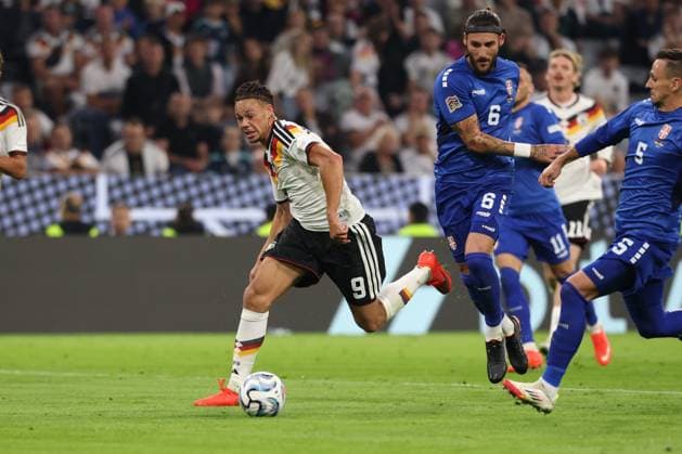 One-on-one, action, featuring Derry Scherhant 9 (Germany) and Nemanja Gudelj 6 (Serbia), Germany vs. Serbia, soccer, UEFA Nations League, Matchday 3, October 1, 2026, Munich, Bavaria, Germany Copyright: xkolbert-press ChristianxKolbertx