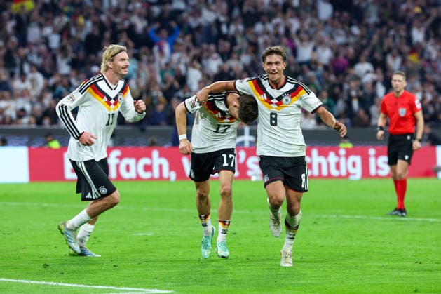 October 1, 2026, GER, Soccer, Men s, UEFA Nations League International Match, League A, Matchday 3, Germany vs. Serbia—Goal celebration for the 2–0 goal by Florian Wirtz (Germany 17), with Tom Bischof (Germany 8) and Nick Woltemade (Germany 11). DFB and DFL regulations prohibit any use of photographs as image sequences and or quasi-video. Munich, Allianz Arena, Bavaria, Germany Copyright: xNordphoto Schneiderx