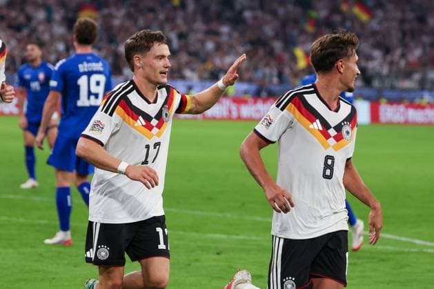 Florian Wirtz, 17, Germany, celebrates with Tom Bischof, 8, Germany, after scoring the goal that made it 2–0, Germany vs. Serbia, soccer, DFL, DFB, UEFA Nations League, 2026–2027 season, group stage, Group B, Matchday 3 of 6, October 1, 2026, Munich, Bavaria, Germany Copyright: xkolbert-press MartinxAgüerax