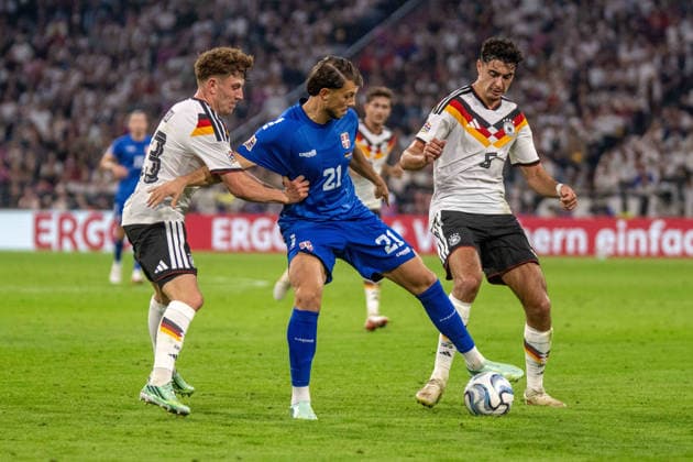 Philipp Treu (GER), Lazar Samardžic (SRB), and Aleksandar Pavlovic (GER) xettx, Germany, Munich, October 1, 2026, Soccer, National Team, Nations League: Germany vs. Serbia, 2026–2027 Season, Matchday 3, Allianz Arena