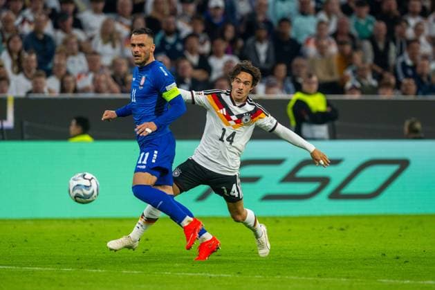 Soccer, Men s, 2026–27 Season, UEFA Nations League League A, Group 2, Matchday 3 in Munich, Germany vs. Serbia; from left: Filip Kostic (Serbia), Mika Baur (Germany), October 1, 2026, Copyright: xMatthiasxKochx