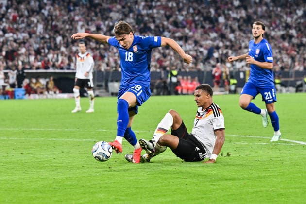 MUNICH, GERMANY; 01. OCTOBER: tackle between Mihajlo CVETKOVIC (Serbia 18) and Malick THIAW (Germany 2) during the UEFA Nations League Match between Germany vs. Serbia at Matchday 3 at Allianz Arena Copyright: xBEAUTIFULxSPORTS Goldbergx