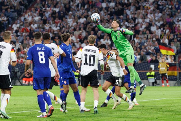 Djordje Petrovic 1, Serbia: Blocking a shot with his fist during the match between Germany and Serbia, soccer, men s, UEFA Nations League, 2026–2027, Matchday 3 on October 1, 2026, in Munich, Allianz Arena, Bavaria, Germany