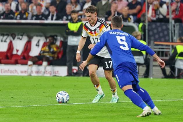 Florian Wirtz 17 (Germany) in action against Nemanja Maksimovic 5 (Serbia), Germany vs. Serbia, Soccer, DFL, DFB, UEFA Nations League, 2026–2027 season, group stage, Group B, Matchday 3 of 6, October 1, 2026, Munich, Bavaria, Germany Copyright: xkolbert-press MartinxAgüerax