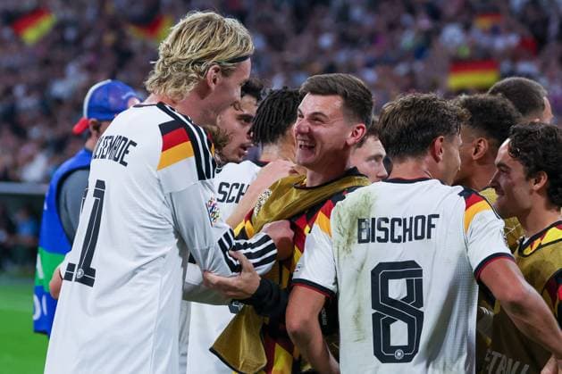 The German national team celebrates a goal after the 2-0 win, featuring Nick Woltemade (11, Germany) and Tom Bischof (8, Germany), Germany vs. Serbia, soccer, DFL, DFB, UEFA Nations League, 2026–2027 season, group stage, Group B, Matchday 3 of 6, October 1, 2026, Munich, Bavaria, Germany Copyright: xkolbert-press MartinxAgüerax