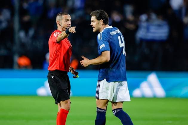 THESSALONIKI , 01-10-2026 , Toumba Stadium , season 2026 2027 , UEFA Nations League football , match between Greece and The Netherlands. picture shows Referee Marco Guida and Greece player Ntinos Mavropanos Greece - Netherlands  x207791423x Copyright: