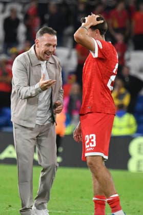 Football - 2026 2027 UEFA Nations League - League A, Group Four: Wales vs. Norway - Cardiff City Stadium - Thursday 1st October 2026 Wales manager Craig Bellingham talks with Joel Colwill WALES as Wales celebrates victory colorsport winston bynorth
