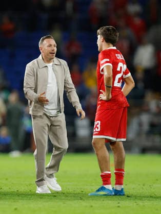 Cardiff, Wales, 1st October 2026. Craig Bellamy coach of Wales and Joel Colwill of Wales react at full time during the Wales vs Norway UEFA Nations League match at the Cardiff City Stadium, Cardiff. Picture credit should read: Cody Froggatt Sportimage EDITORIAL USE ONLY. No use with unauthorised audio, video, data, fixture lists, club league logos or live services. Online in-match use limited to 120 images, no video emulation. No use in betting, games or single club league player publications. SPI_135_CF_WALES_NORWAY SPI-5050-0135