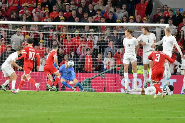 Football - 2026 2027 UEFA Nations League - League A, Group Four: Wales vs. Norway - Cardiff City Stadium - Thursday 1st October 2026 Neco Williams WALES beats orjan Nyland NORWAY from a free kick colorsport winston bynorth