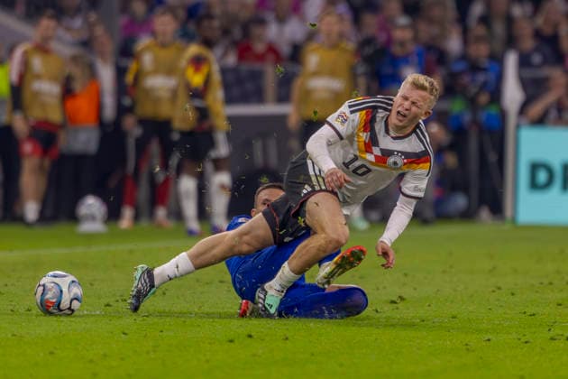 Munich, Germany, October 1, 2026 UEFA Nations League 2026–2027 League Phase Group A2 Match 3: Germany vs. Serbia Pictured from left in a tackle: Nemanja Maksimovic (SRB) and Jonathan Burkardt (GER). DFB and DFL regulations prohibit any use of photographs as image sequences and or quasi-video at the Allianz Arena, Bayern Copyright: xFotostandx xSchäferx