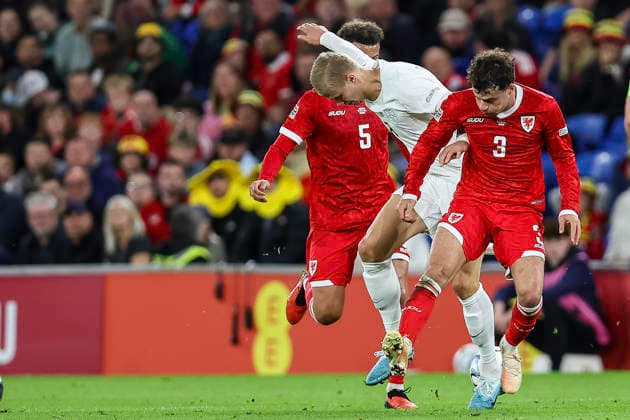 Wales v Norway - UEFA Nations League 2026 27 Group A4 MD3 Erling Haaland of Norway, wearing number 9, attempts to move between Ethan Ampadu of Wales, number 5, and Neco Williams of Wales, number 3, during the UEFA Nations League Group 4 match between Wales and Norway at the Cardiff City Stadium in Cardiff, on October 1, 2026. Cardiff South Glamorgan United Kingdom  Copyright: xMIxNewsx originalFilename:fletcher-walesvsn261001_npUEx.jpg