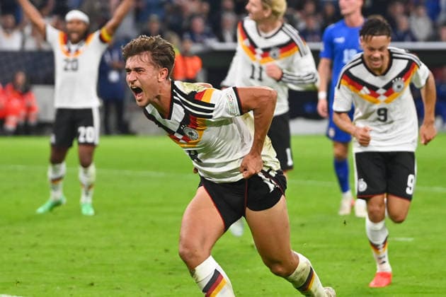 Tom BISCHOF (GER) celebrating after scoring the 1-0 goal, Celebration, joy, excitement, action, single frame, cropped single shot, half-length shot, soccer Nations League group stage, Group B, Matchday 3: Germany (GER) vs. Serbia (SRB) 2–0 on October 1, 2026, ALLIANZ ARENA