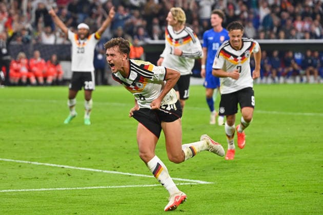 Tom BISCHOF (GER) celebrating a goal (1-0), celebration, joy, excitement, action, individual play, single frame, cutout, full-body shot, full-figure shot, UEFA Nations League group stage, Group B, Matchday 3: Germany (GER) vs. Serbia (SRB) 2–0 on October 1, 2026, Allianz Arena