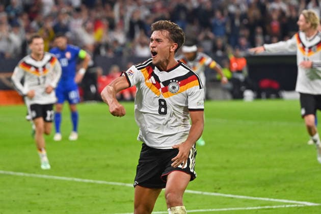 Tom BISCHOF (GER) celebrating after scoring the 1-0 goal, Celebration, Joy, Excitement, Action, Single Frame, Cropped Single Shot, Half-Figure, Half-Figure Soccer Nations League Group Stage, Group B, Matchday 3: Germany (GER) vs. Serbia (SRB) 2–0 on October 1, 2026, ALLIANZ ARENA